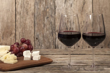 red wine glasses and bottle