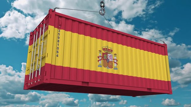 Cargo container with flag of Spain. Spanish import or export related conceptual 3D animation