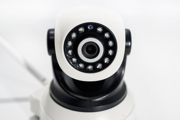 Spy video camera isolated on white background. Abstract surveillance idea
