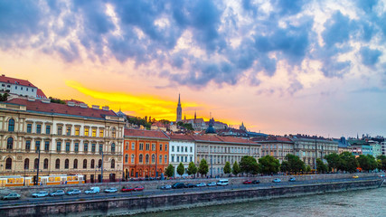 Fototapeta na wymiar Colorful sunset over the historical district of Budapest city in Hungary