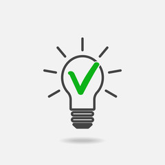 Light bulb and green checkmark vector icon. The symbol of the origin of the idea.  Flat image euro icon with shadow.  Layers grouped for easy editing illustration. For your design.