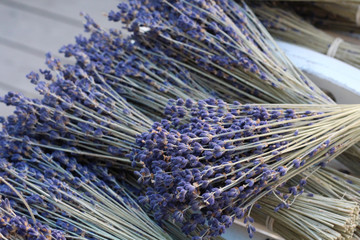 small bouquets of lavender on a wooden table