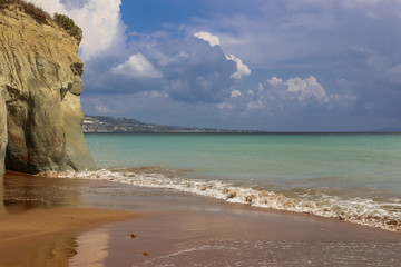 Sea view and cloudy sky before the storm. Photo taken on the famous Xi beach with red sand and clay...