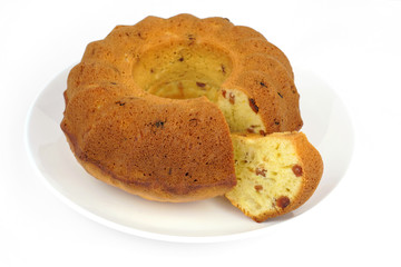 New baked raisin cake isolated on white background.