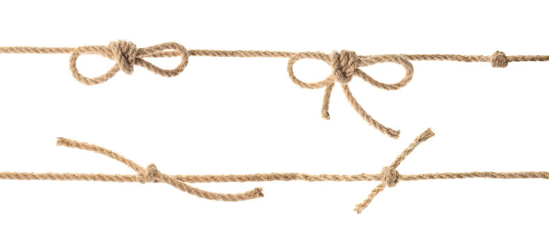 Set with hemp rope, knots and bows on white background