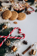 Winter hot drink. Chocolate or cocoa with marshmallow, cookies, candy on white background.