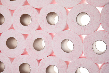 Many rolls of toilet paper as background