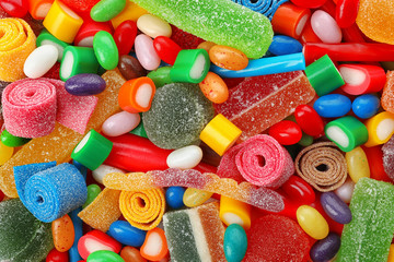 Fototapeta na wymiar Pile of delicious colorful chewing candies as background