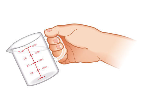 計量カップを持つ手 Stock イラスト Adobe Stock