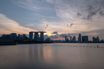 Singapore business district skyline with sunset