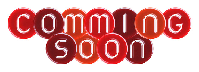 comming soon - text cut through multi-colored round translucent overlapping candies on white background