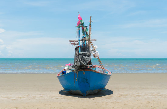 Blue Fishing Boat on Sam Roi Yod Beach Prachuap Khiri Khan Thailand Center