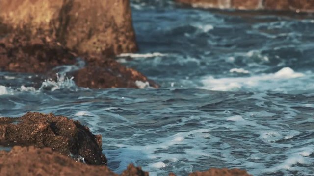 Wavering waves on the little coast.