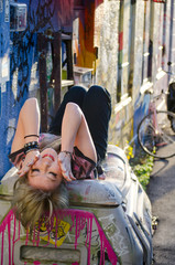 Japanese Girl poses on the street in Shibuya, Japan. Shibuya is a town which young people hang out and go shopping.