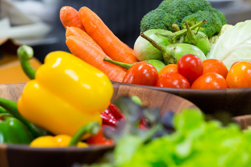 Bell peppers and mixed veggies on the background