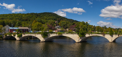 Trolly bridge over the river with blue sky