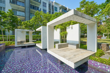 Stone cement relax chair at garden of residential .
