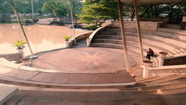 Mini Circular Amphitheatre in Taman Merdeka Public Park facing man-made lake in Johor Bahru, Malaysia