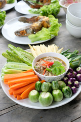 Thai food, Fried mackerel with shrimp paste sauce and vegetable.