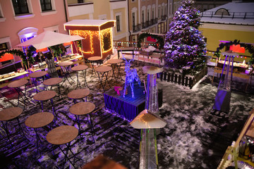 cafe, open-air market with New Year's decorations