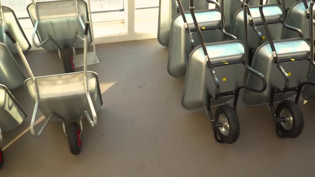 Multiple Wheelbarrows for sale in hardware store