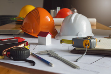Engineer and Architect concept, Engineer Architects and real estate agent office team working with blueprints