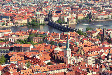 Fototapeta na wymiar Aerial view to Prague historic center with Charles Bridge in the middle