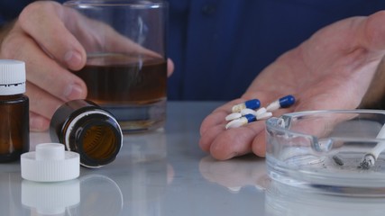 Vicious Person Combine Alcohol Drugs and Cigarettes in a Bad Behavior