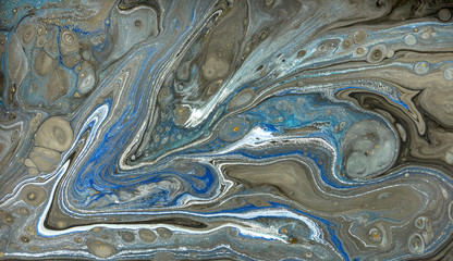 Gold marbling texture design. Blue and golden marble pattern. Fluid art.