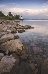 Church on Rocky Beach of Liptovska Mara Lake in Slovakia