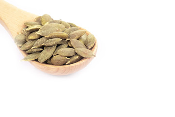 Pumpkin seeds on a white background