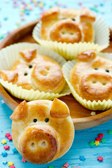 Pig bread buns, funny baking idea shaped cute piggy faces, symbolic food for new year 2019