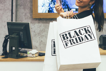 Young woman with shopping bags