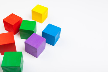 Obraz premium Colorful wooden building blocks isolated on white background