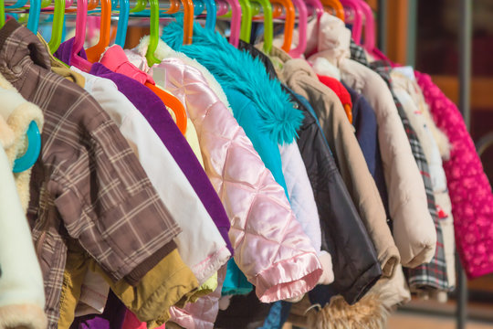 Rack Of Baby And Children Used Dress, Clothes Displayed At Outdoor Hanger Market For Sale.