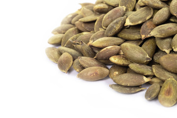 Pumpkin seeds on a white background