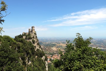 Fototapeta na wymiar Republic of San Marino. View of Torre Guaita or prima torre. The Guaita fortress is the oldest of the three Towers constructed on Monte Titano, and the most famous.