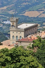 Fototapeta na wymiar Republic of San Marino. The Palazzo Pubblico (Public Palace) is the town hall of the City of San Marino as well as its official Government Building.