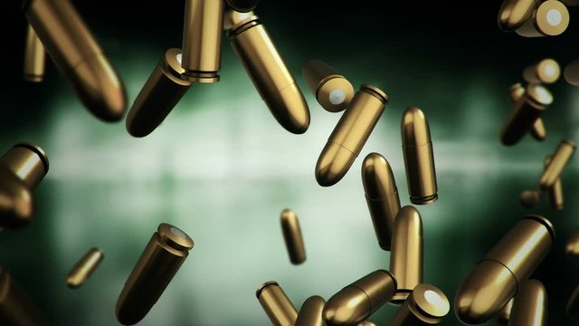 Animation falling of bullets different calibers on dark and blurred background. Animation of seamless loop.