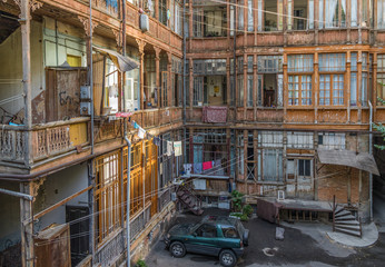 Tbilisi, Georgia - the georgian capital displays, among the other beauties, a great variety of inner gardens and old buildings, often made of colorful wood 