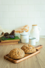 composition of bread with dish wooden on wood table.