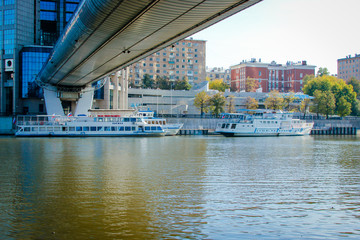 bridge over river and boats on the river