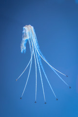 aerobatic performance with a white smoke