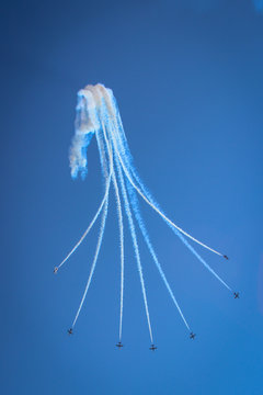 aerobatic performance with a white smoke