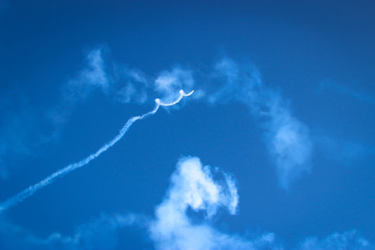 aerobatic performance with a white smoke