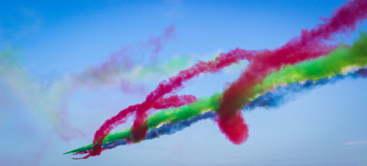 aerobatic performance with a rainbow smoke