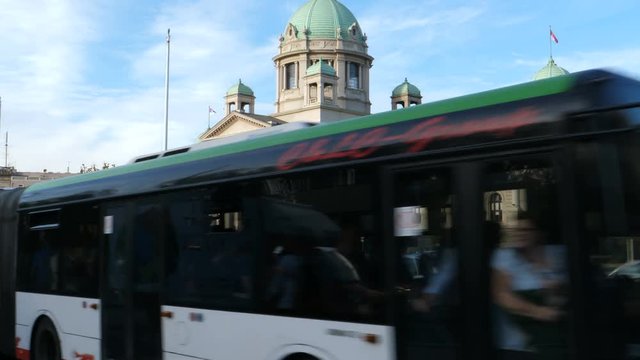 Cars traffic and pollution at a traffic light in front of the Serbian parliament building in Belgrade. Belgrade 21 October 2017