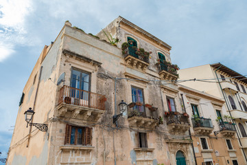 Fototapeta na wymiar Architectural details. Ortigia. Small island which is the historical centre of the city of Syracuse, Sicily. Italy.