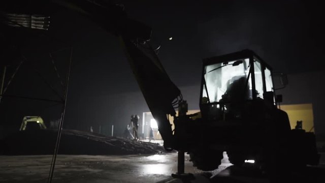 Backhoe is using dipper arm bucket