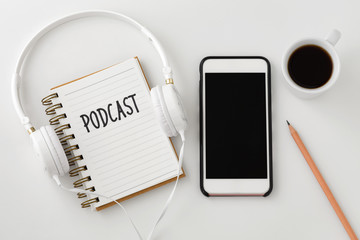 Podcast concept with smartphone and headphones